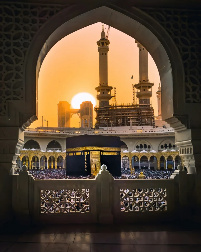 The Kaaba framed by an archway at Masjid al-Haram in Makkah